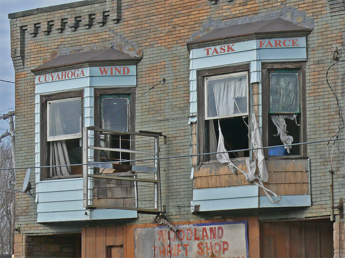 cleveland vacant building ripped curtains blowing out window 
