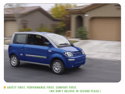 The Zenn Car On A Surburban Street The Zenn Car On A Surburban Street